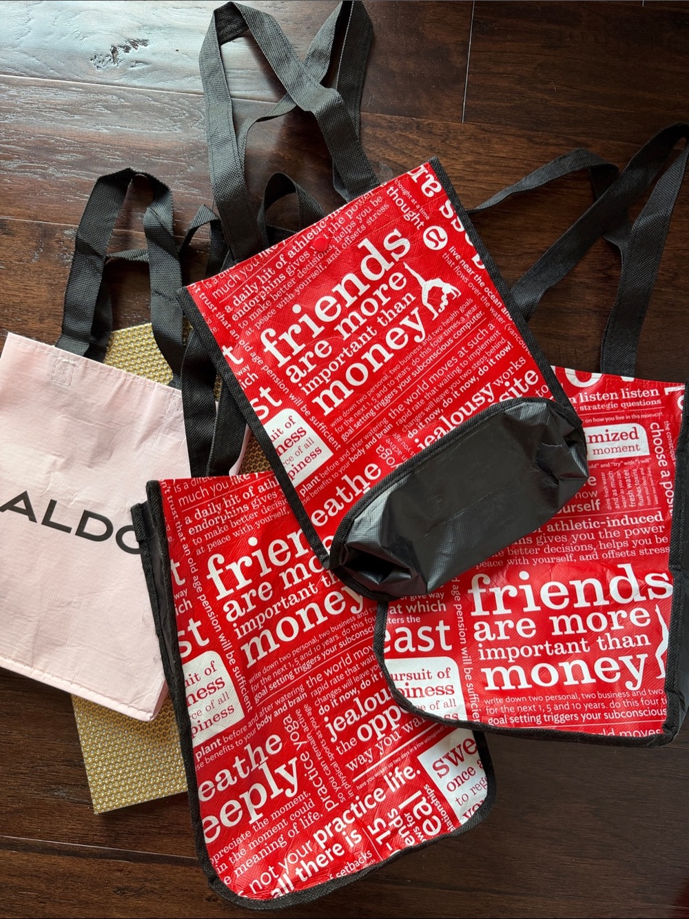 3 Lululemon tote and 1 pink and brown ALDO tote. Great condition.